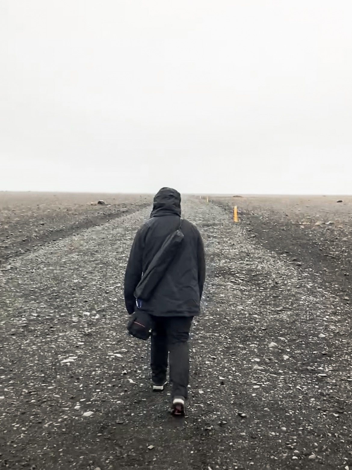 A young woman treks the long and barren walk to the DC-3 Plane Wreck