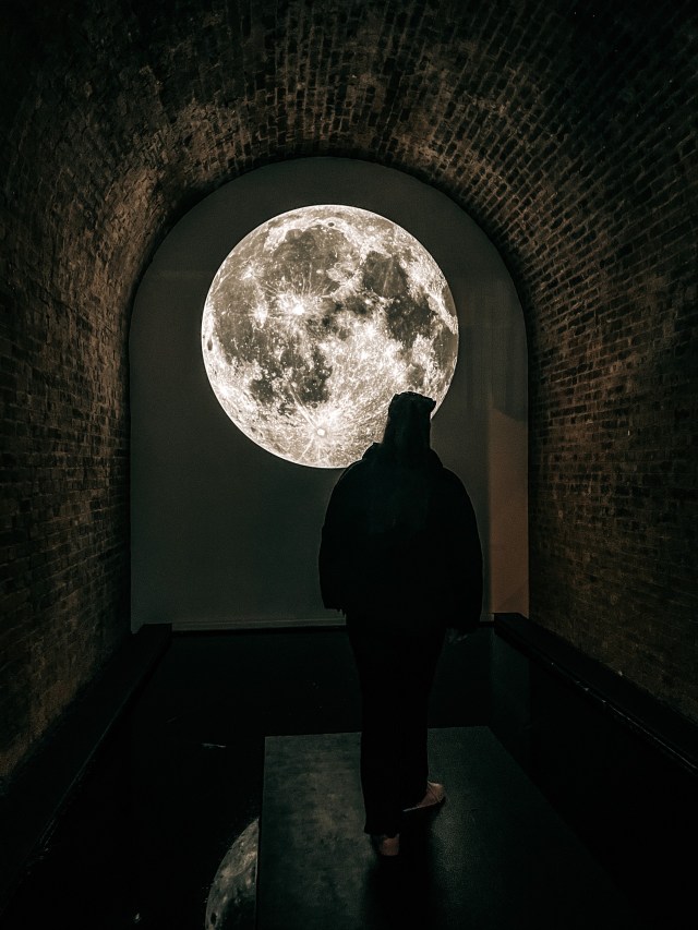 One of the Zones in the Delight Media Art Exhibition, London. Artwork featuring a projection of the moon above water.