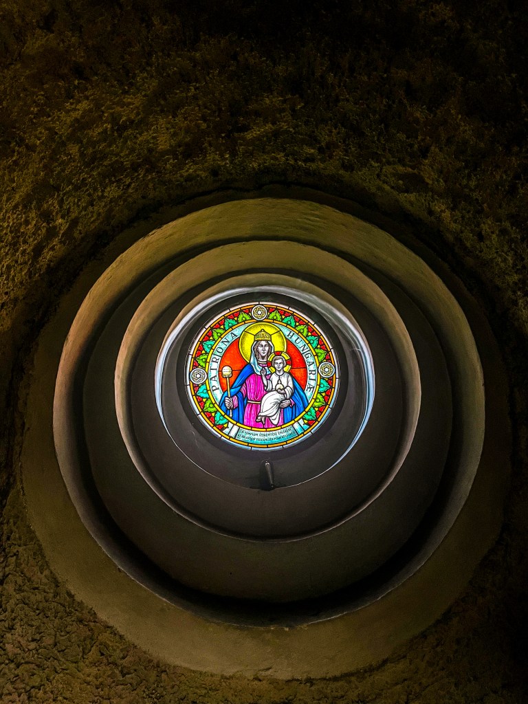 A stained glass window in the Budapest cave church.